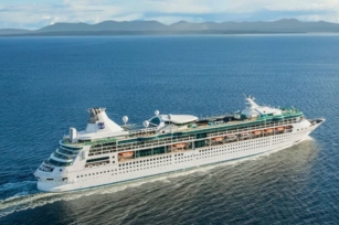 aerial view of the Cruise ship Enchantment of the Seas on the calm waters on a sunny clear day.