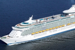 aerial view of the independence of the Seas featuring the top deck as well as the deep blue seas