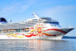 Image of Norwegian Sun cruise ship showing the vibrant colours wrapping around the ship 