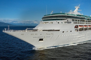 close up of the front of the Rhapsody of the Seas cruise ship featuring the clear skies and blue skies